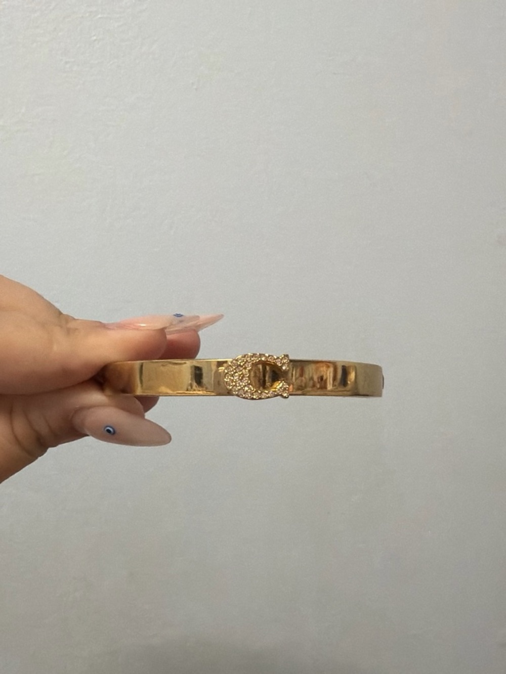 Coach Gold-Tone Crystal Buckle Bangle Bracelet
